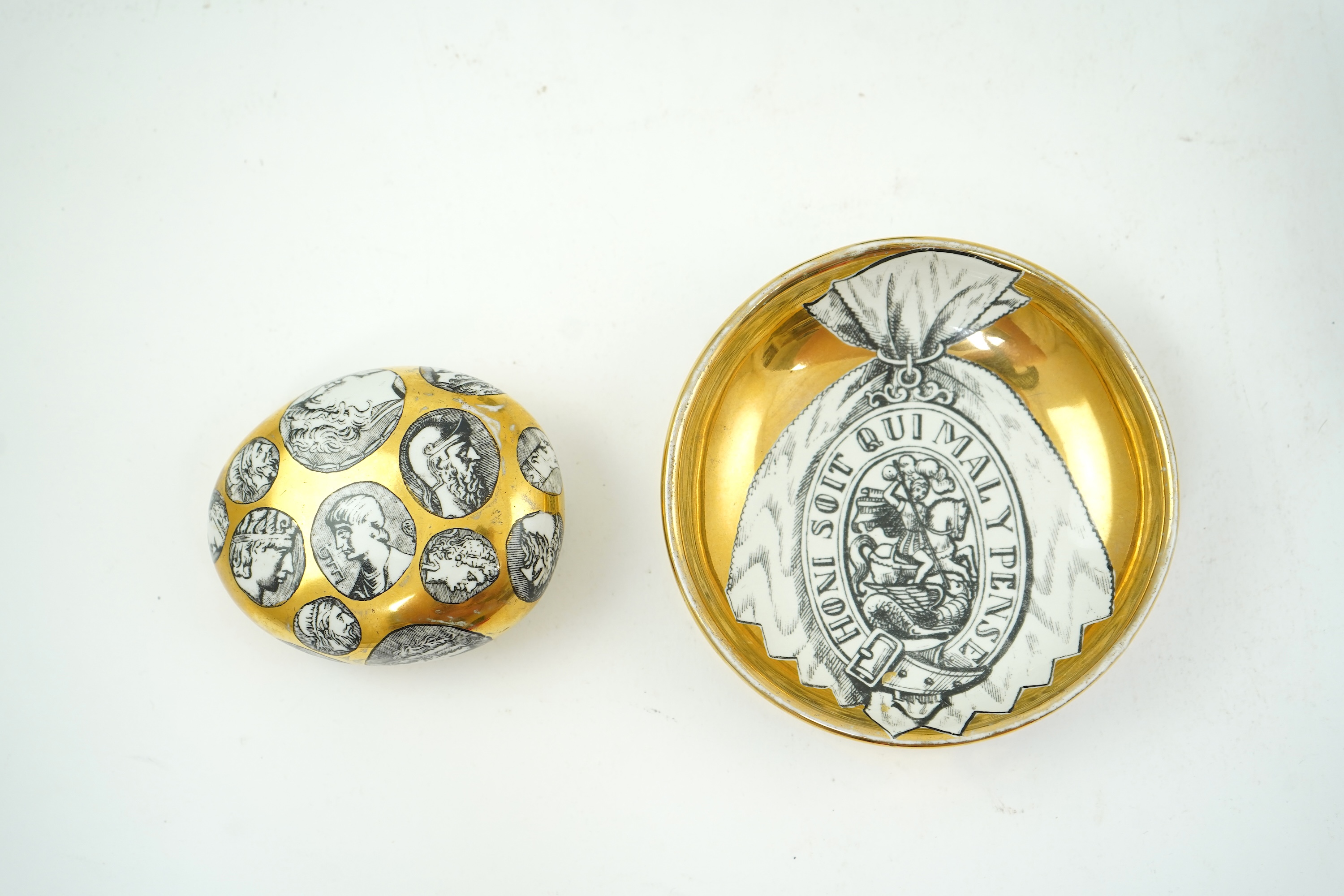 Piero Fornasetti (Italian, 1913-1988): A collection of Fornasetti desk items and dishes